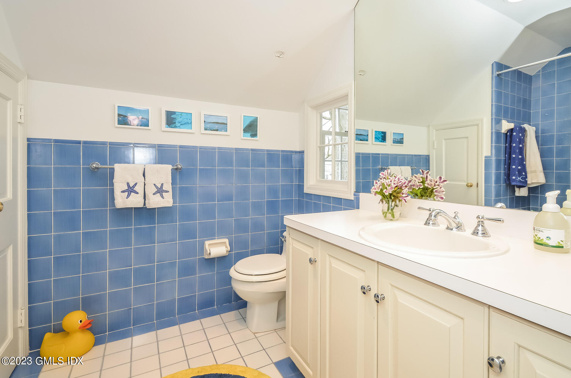 16 Willow Road Riverside, CT 06878 - Photo 23 of 30 a bathroom with a sink toilet and mirror