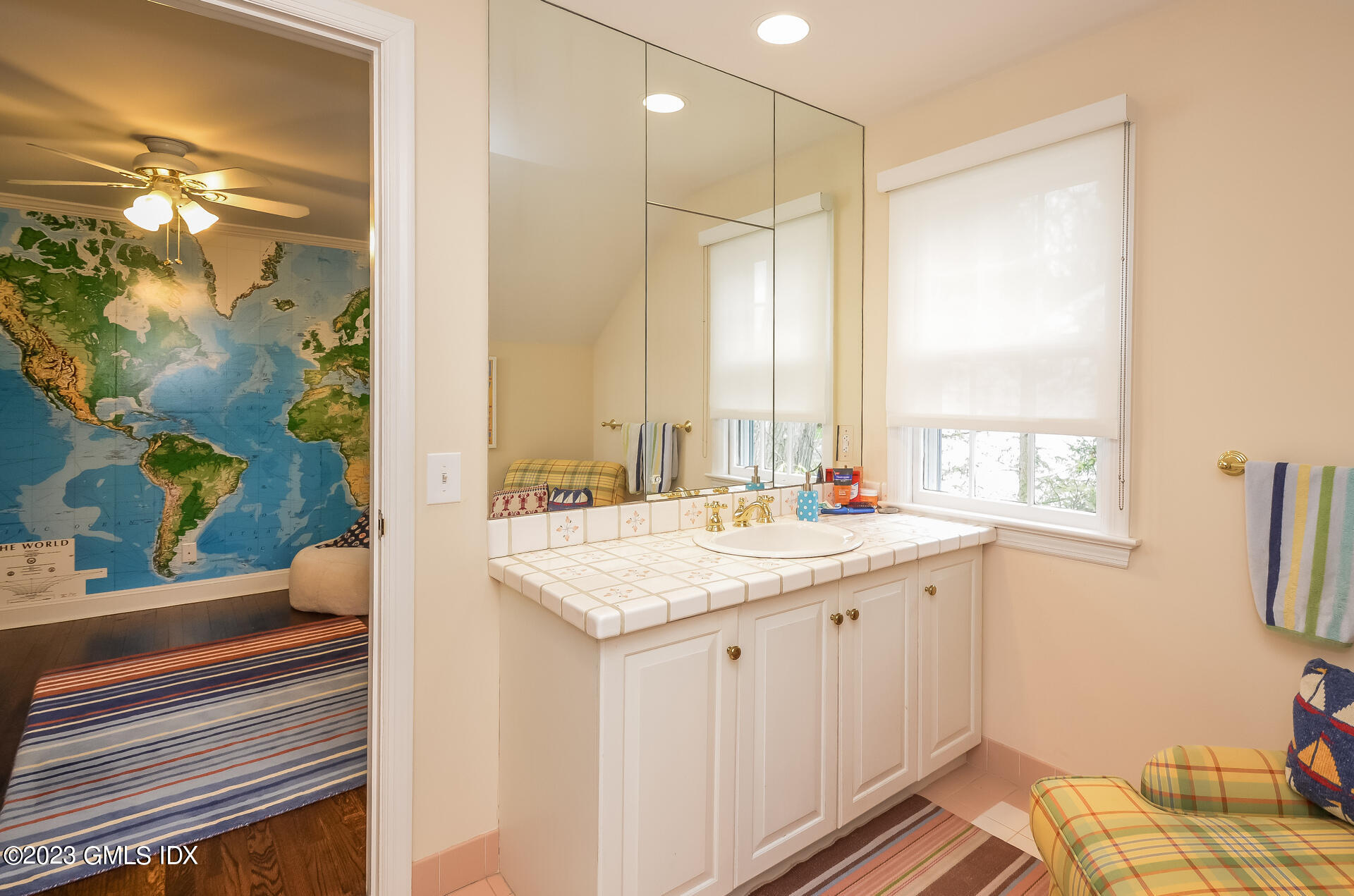 16 Willow Road Riverside, CT 06878 - Photo 25 of 30 a bathroom with a sink double vanity and a mirror