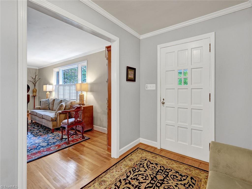 798 Hertford Road Winston-Salem, NC 27104 - Photo 6 of 36 The foyer and view to the living room