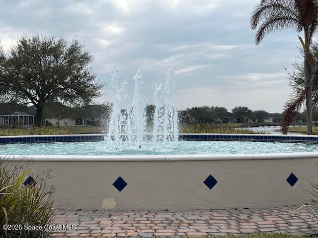 3111 Le Conte Street Melbourne, FL 32940 - Photo 30 of 33 a view of a outdoor space with a lake view