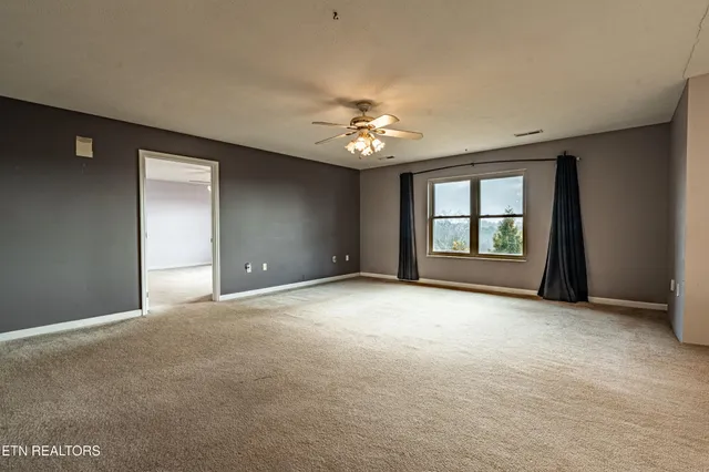 a view of a room with a balcony