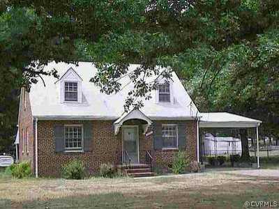 5204 Raleigh Road Richmond, VA 23231 - Photo 1 of 1 a front view of a house with yard and trees