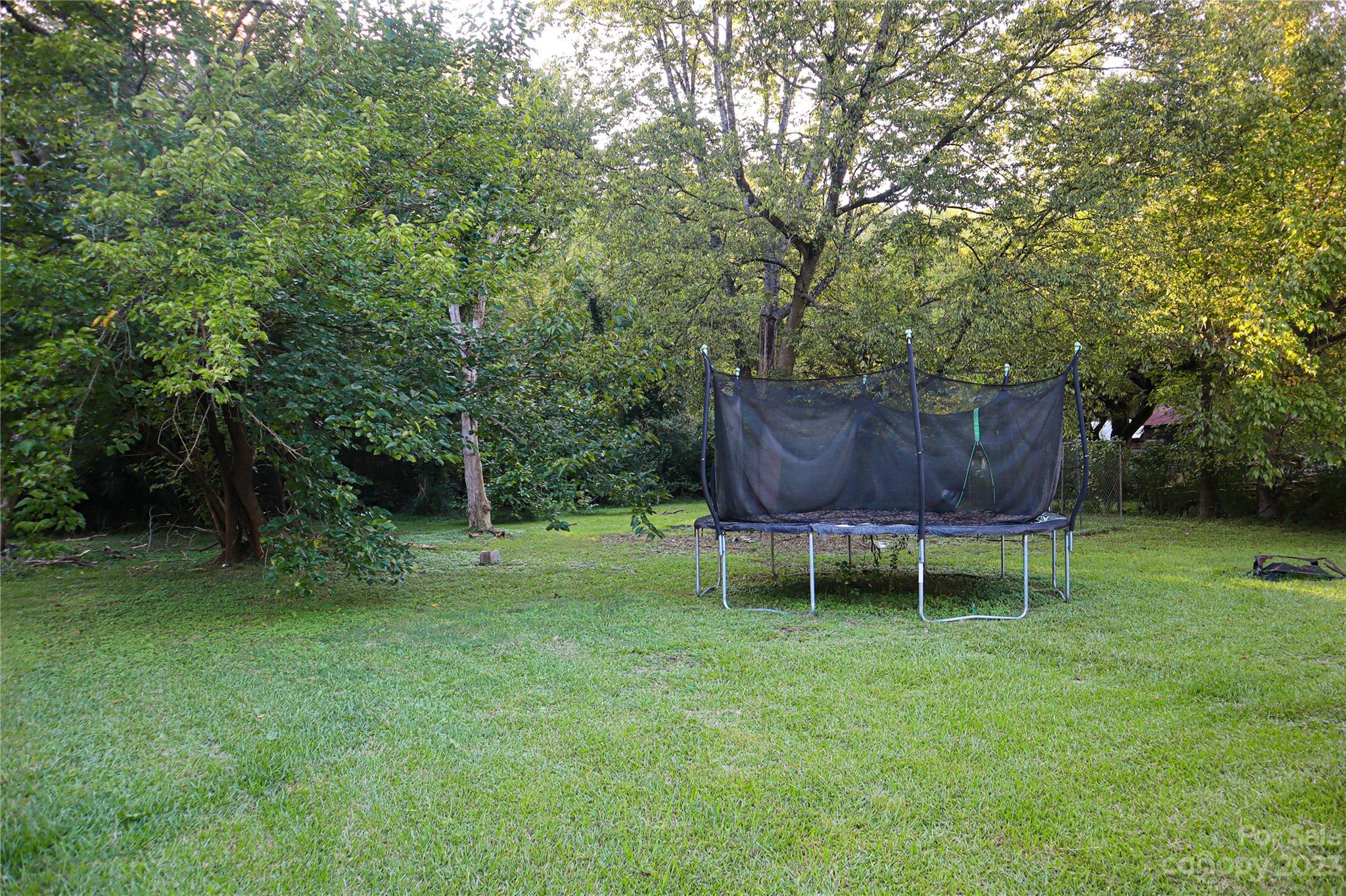 482 Porter Road Rock Hill, SC 29730 - Photo 3 of 3 a backyard of a house with table and chairs