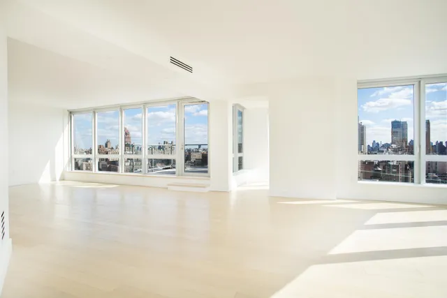 a view of a balcony with chairs
