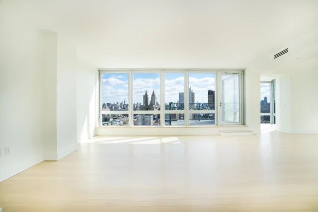 a view of a living room and entry way