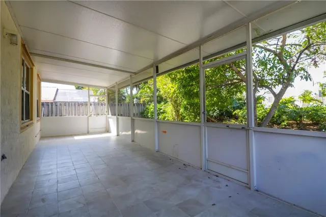 a view of an outdoor space with a large window