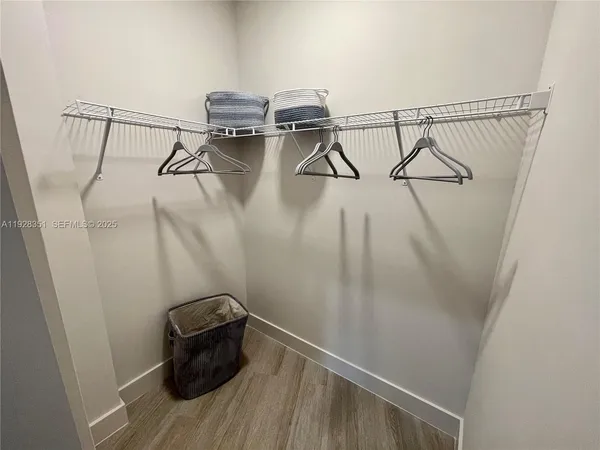 a view of a room with rack on the wall