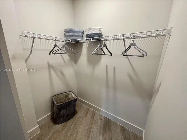 a view of a room with rack on the wall