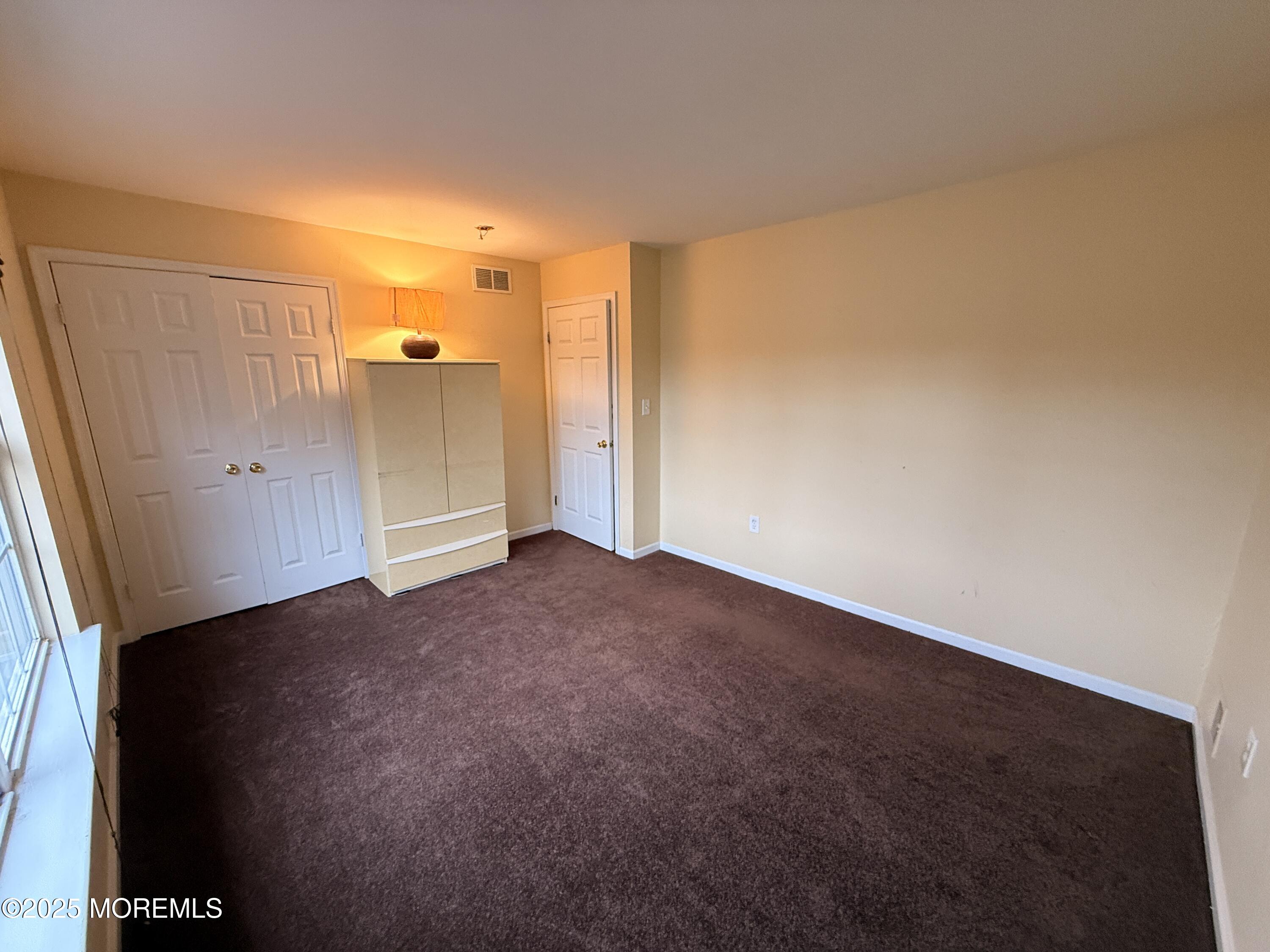 1811 Bellmore Street Oakhurst, NJ 07755 - Photo 16 of 49 a view of a big room with closet