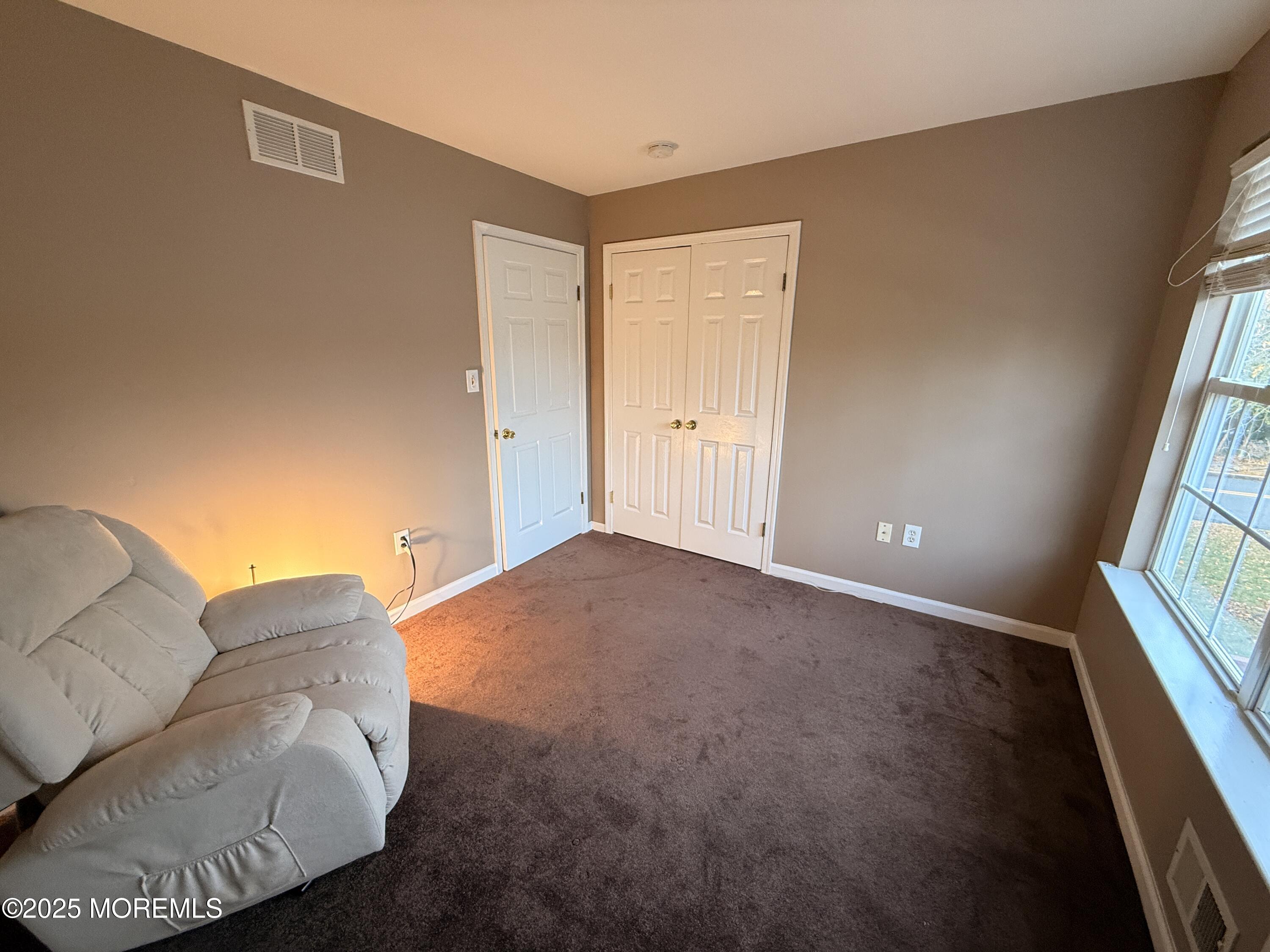 1811 Bellmore Street Oakhurst, NJ 07755 - Photo 21 of 49 a view of livingroom with furniture and window
