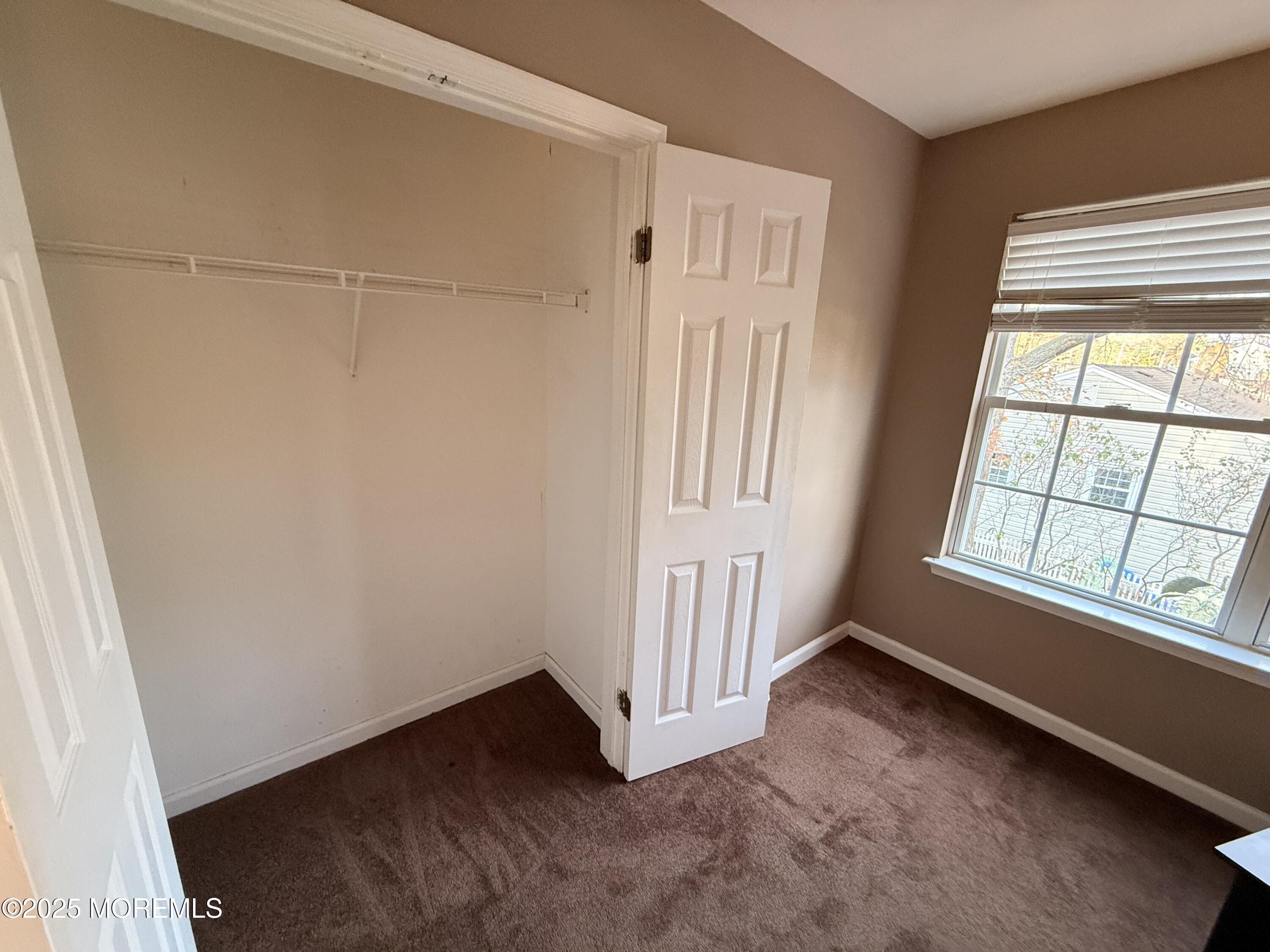 1811 Bellmore Street Oakhurst, NJ 07755 - Photo 22 of 49 an empty room with a window