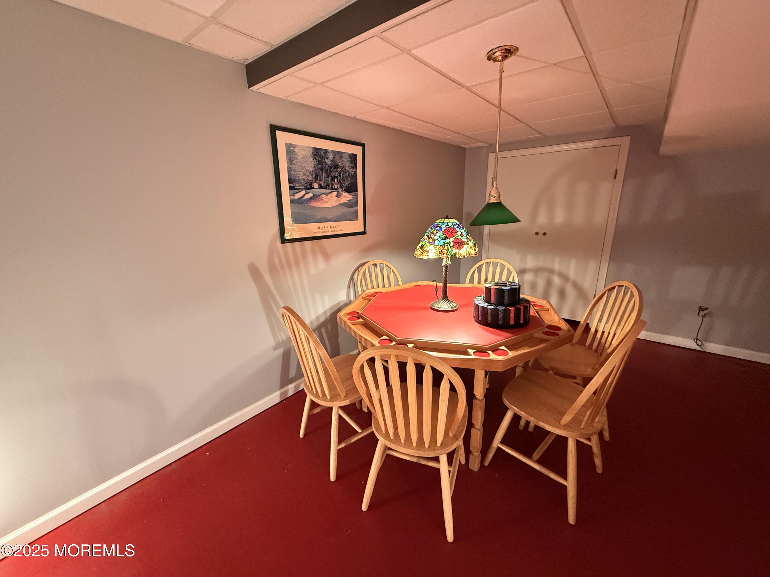 1811 Bellmore Street Oakhurst, NJ 07755 - Photo 26 of 49 a dining room with furniture and wooden floor