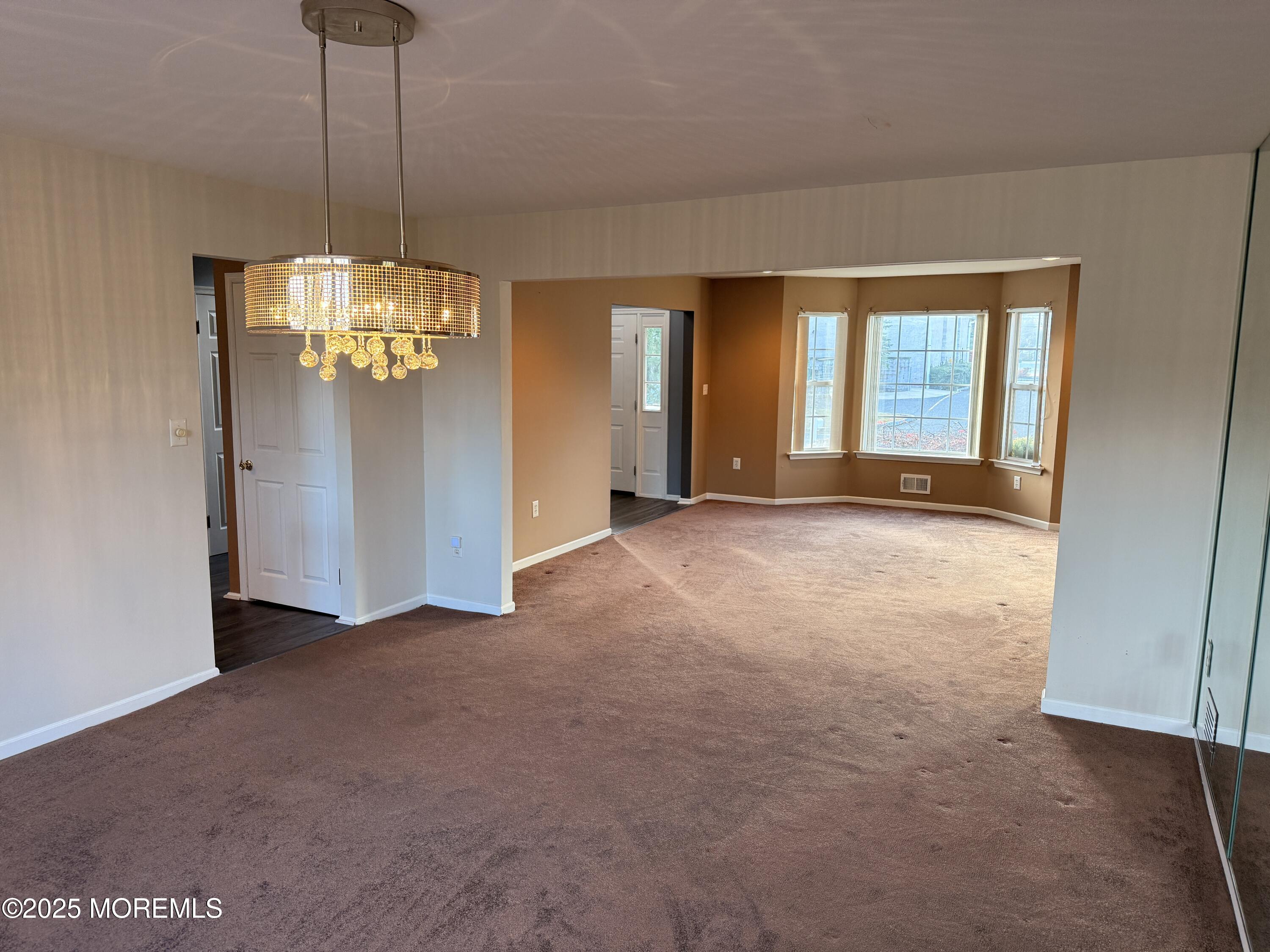 1811 Bellmore Street Oakhurst, NJ 07755 - Photo 3 of 49 a view of an empty room with a window