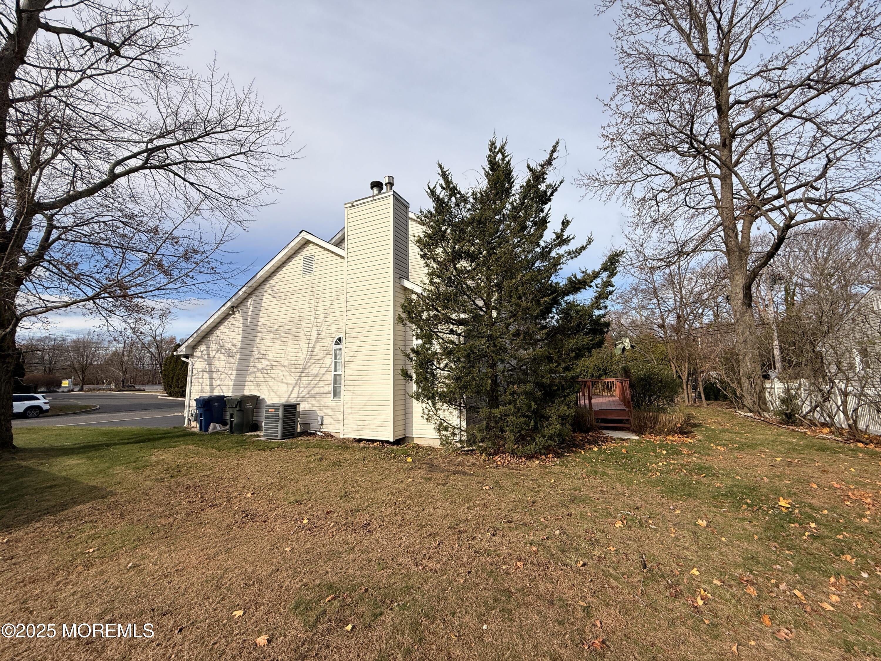 1811 Bellmore Street Oakhurst, NJ 07755 - Photo 37 of 49 a view of a yard with a tree