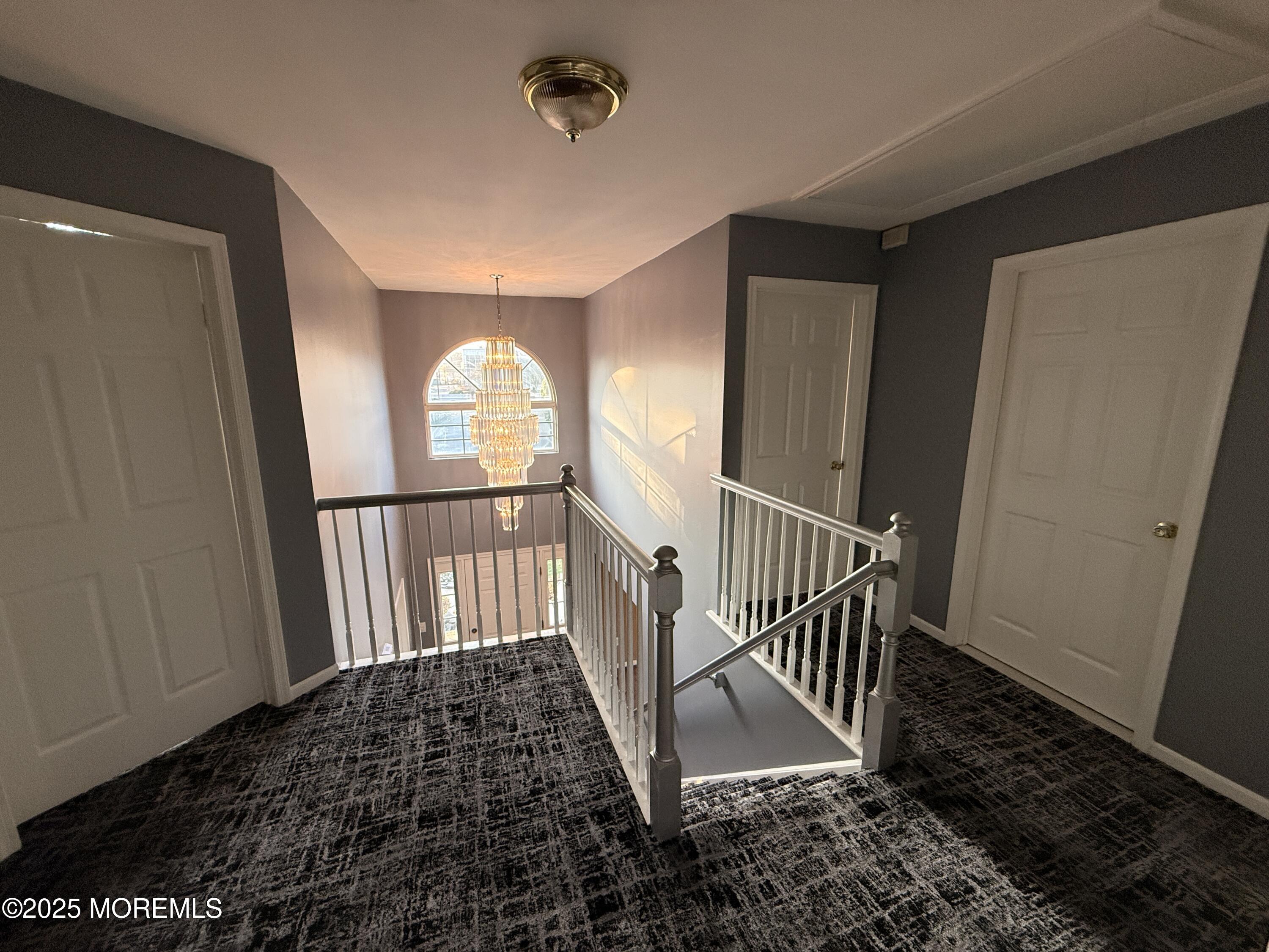 1811 Bellmore Street Oakhurst, NJ 07755 - Photo 6 of 49 a view of entryway with wooden floor