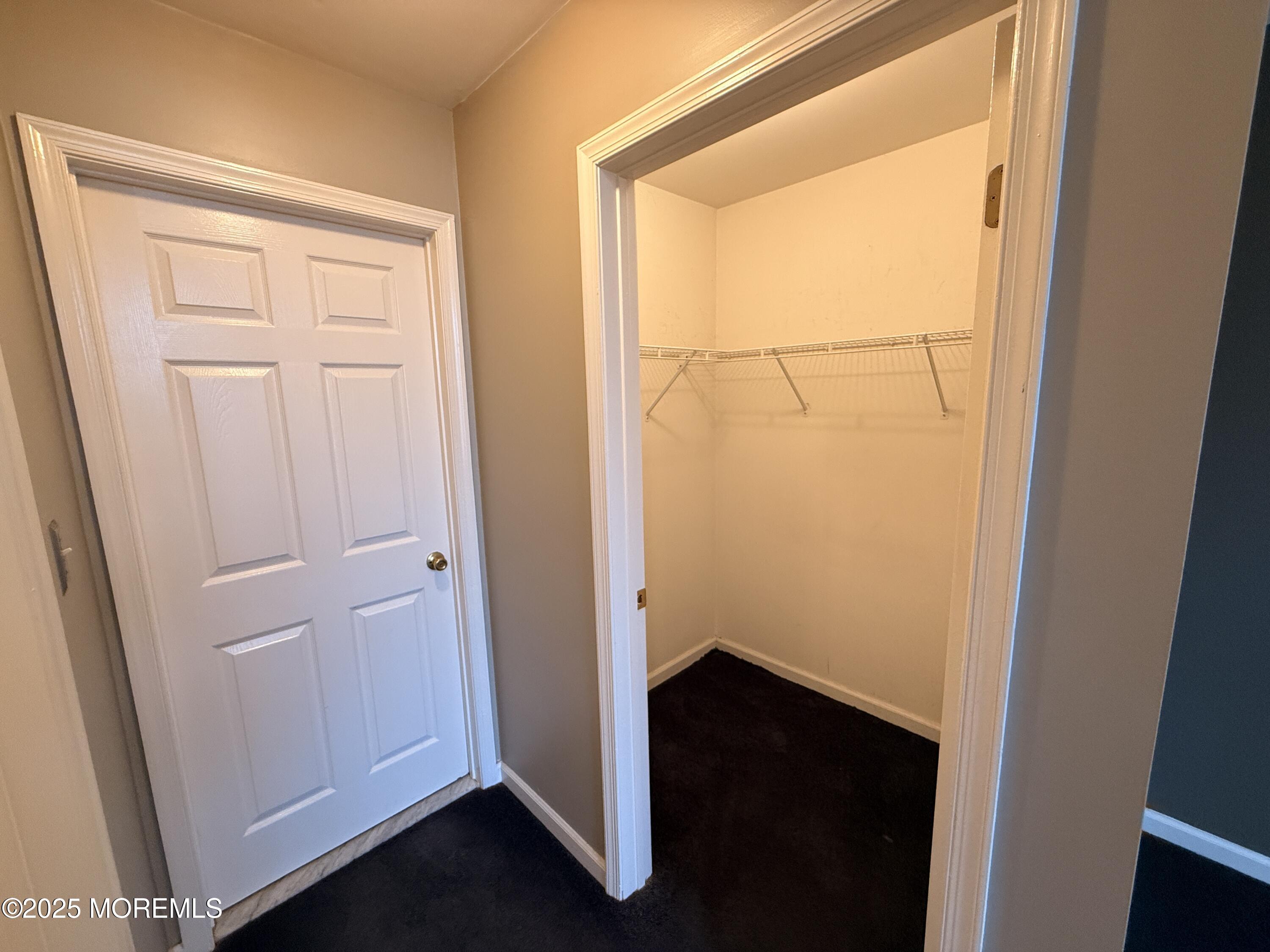 1811 Bellmore Street Oakhurst, NJ 07755 - Photo 10 of 49 an empty room with a door