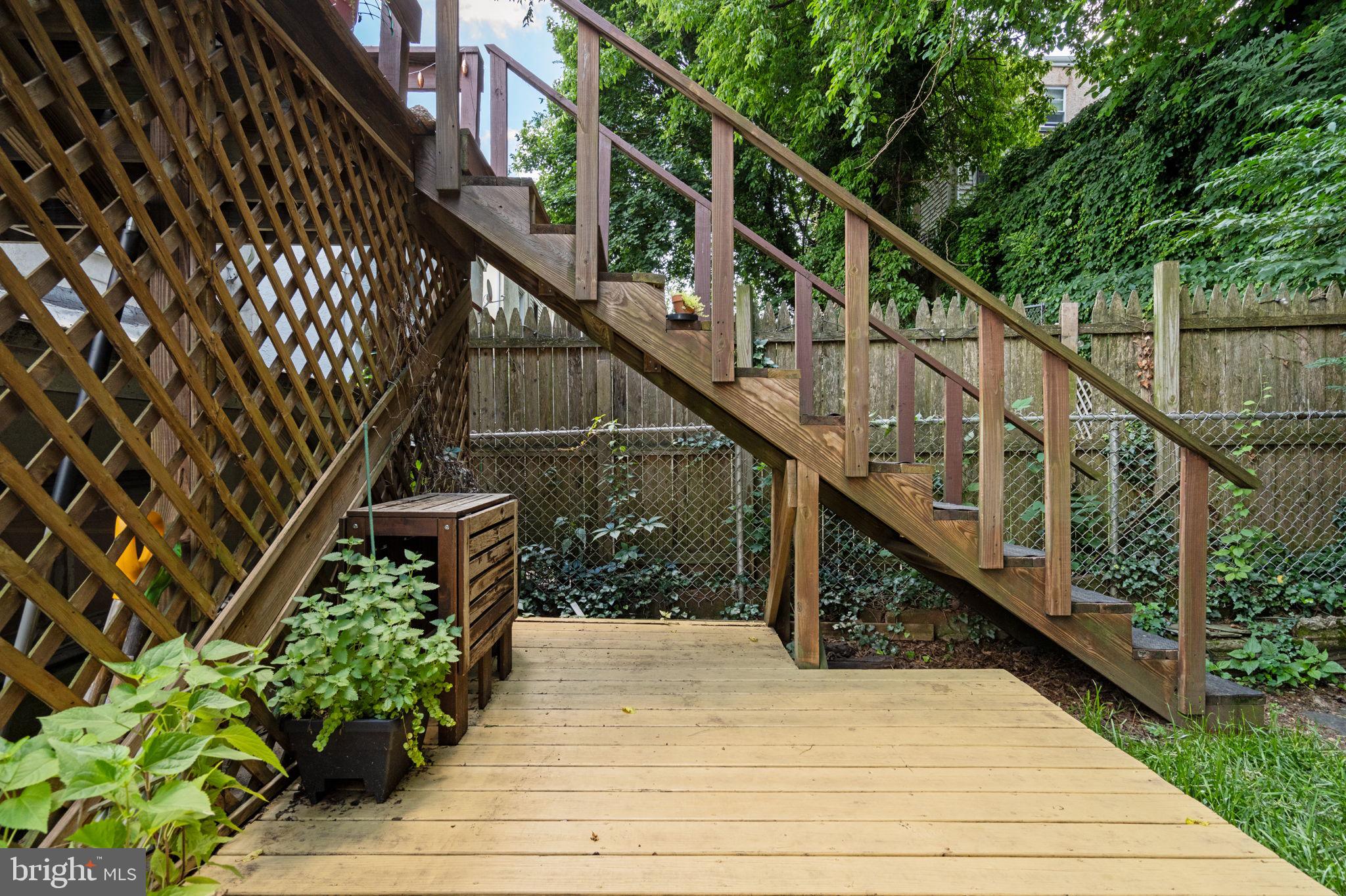 4092 Pechin Street Philadelphia, PA 19128 - Photo 25 of 28 a balcony with wooden floor and white walls