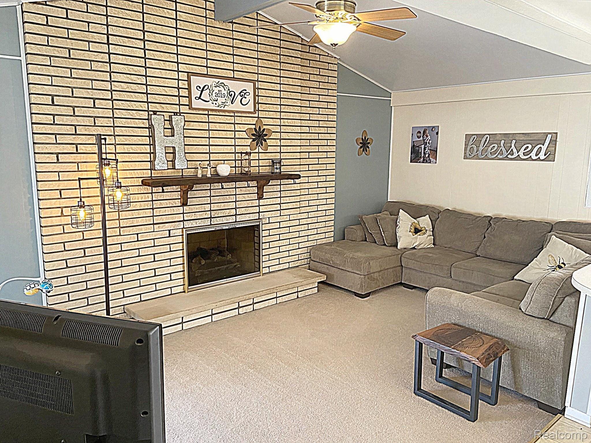 43973 Brandywyne Road Canton, MI 48187 - Photo 8 of 40 Gas Fireplace, vaulted ceiling