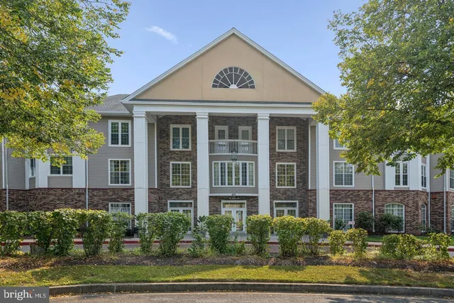 a view of a chairs and table on the deck