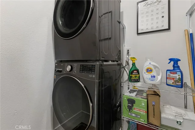 a spacious bedroom with a bed and a couch