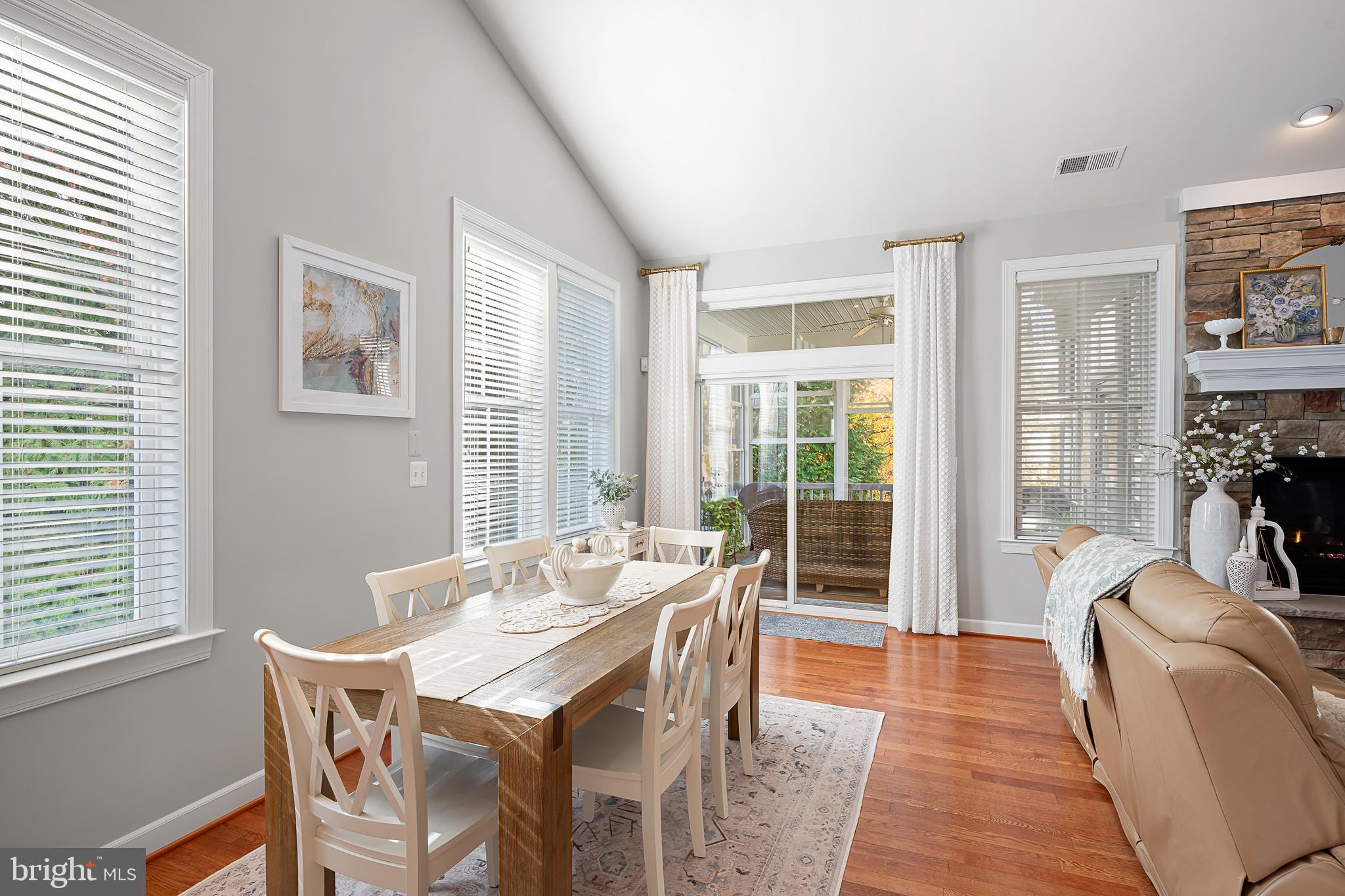 30919 Fresh Pond Drive Ocean View, DE 19970 - Photo 10 of 53 a dining room with furniture and wooden floor