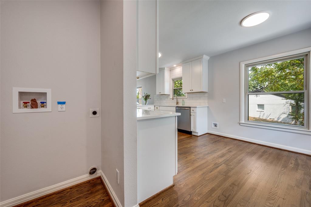 1342 Michigan Avenue Dallas, TX 75216 - Photo 15 of 25 Washroom with dark wood finished floors, hookup for an electric dryer, and hookup for a washing machine