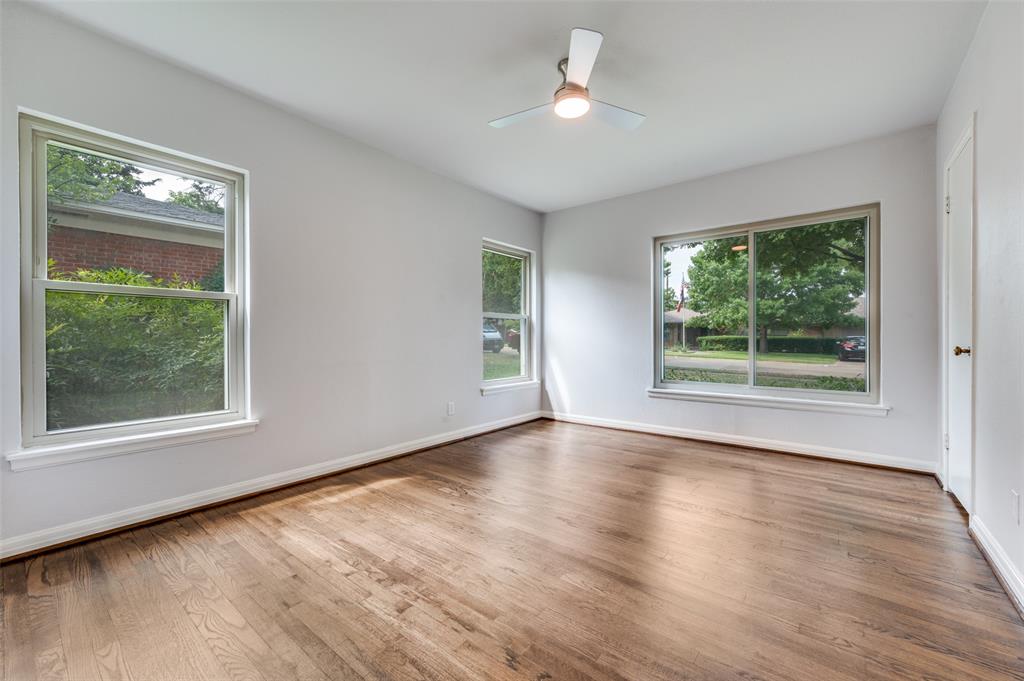 1342 Michigan Avenue Dallas, TX 75216 - Photo 21 of 25 Unfurnished room featuring wood finished floors and ceiling fan