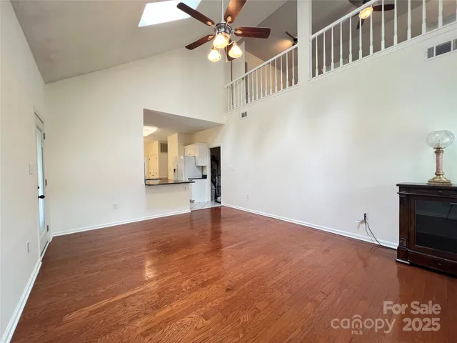 a bathroom with a toilet a sink and a mirror