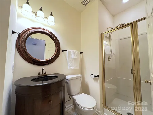 a bathroom with a tub sink and vanity