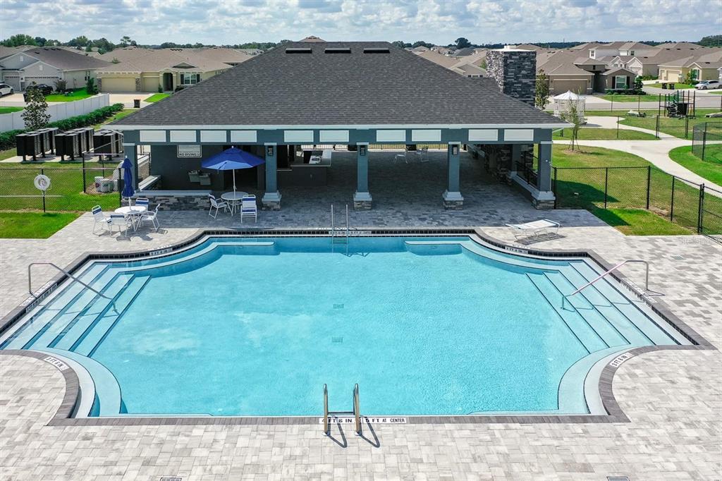 8072 Southwest 59th Terrace Ocala, FL 34476 - Photo 19 of 21 a front view of house with outdoor seating