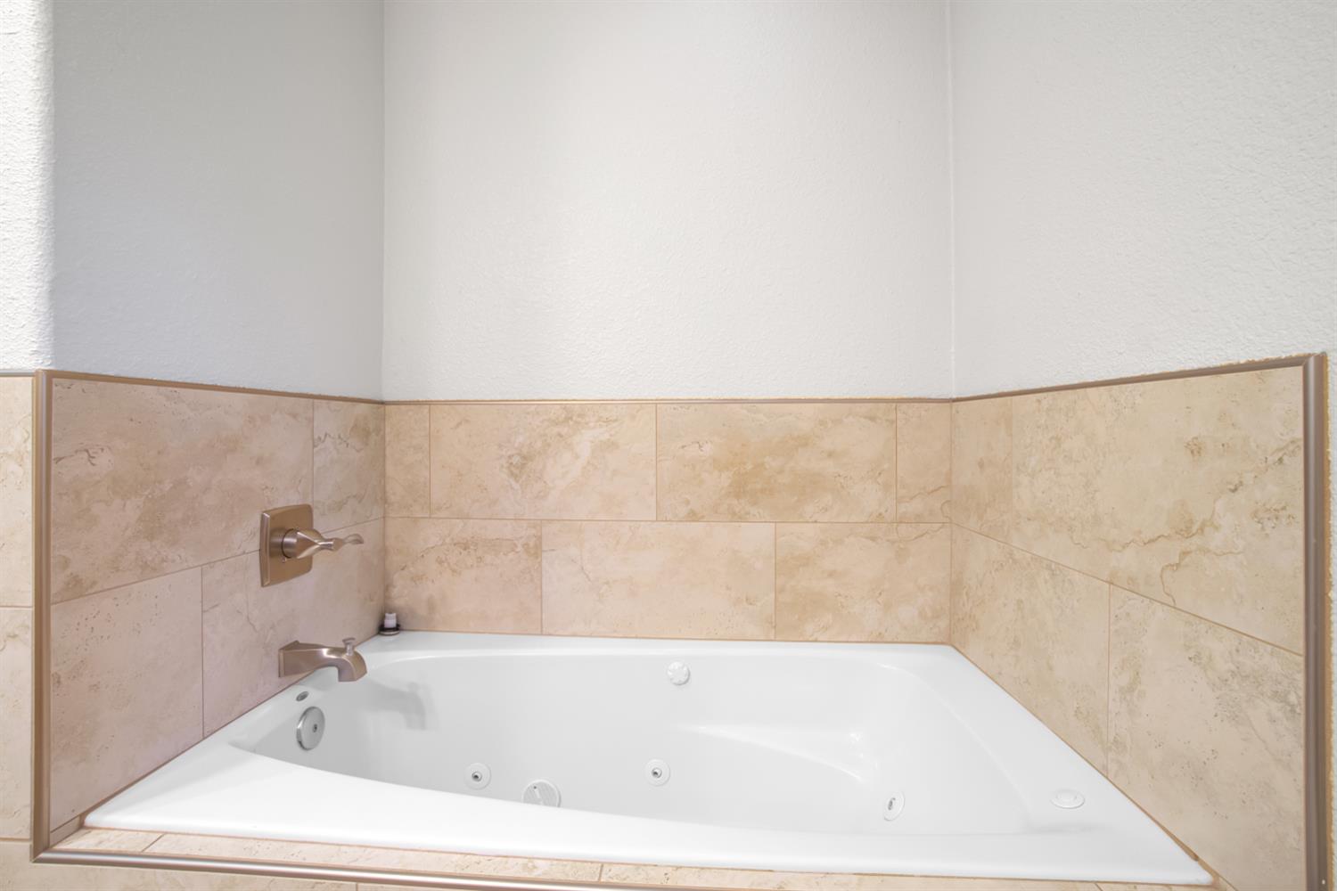 6299 Horseshoe Bar Road Loomis, CA 95650 - Photo 43 of 43 a bathroom with a bathtub