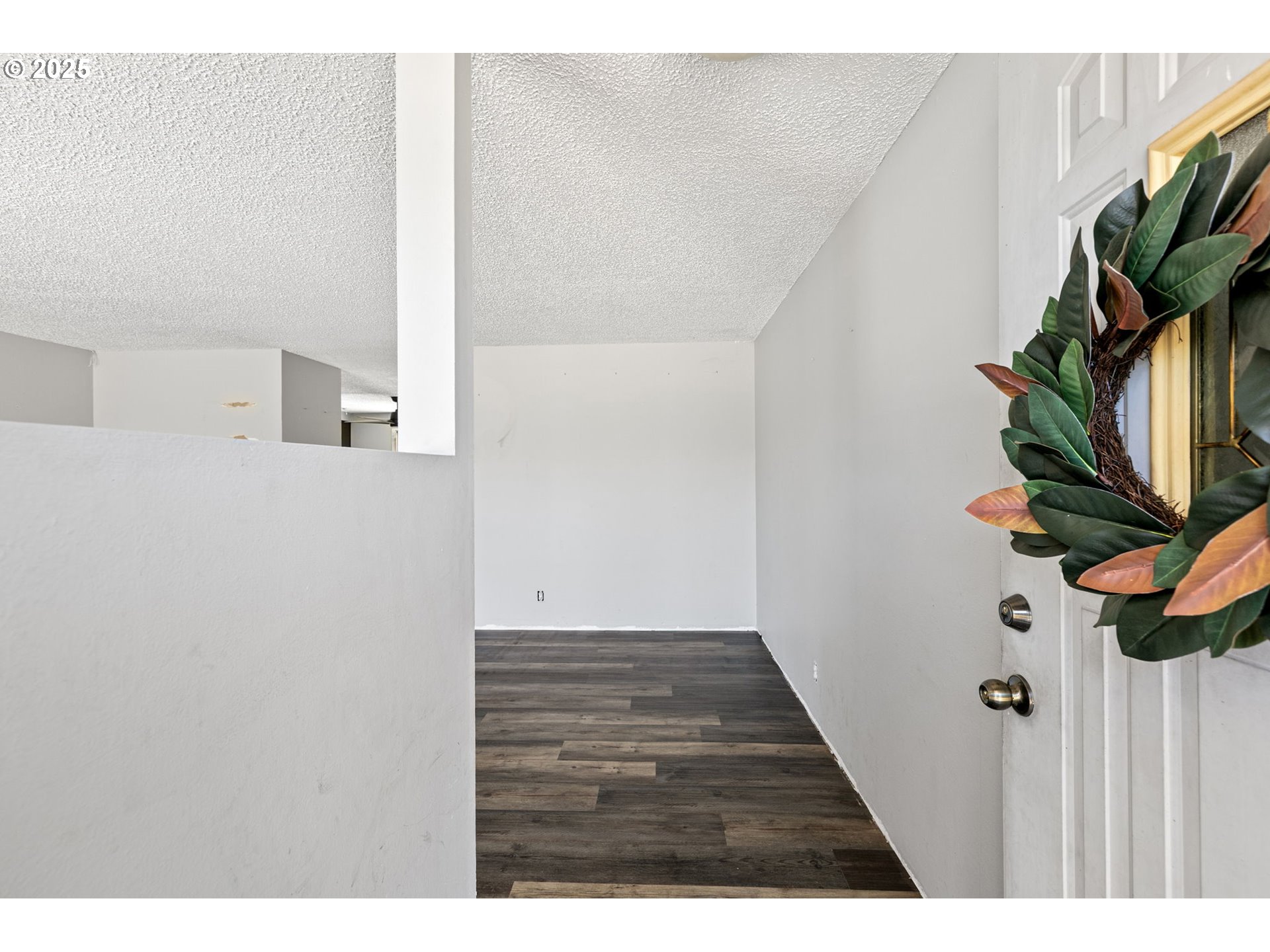 34879 Seavey Loop Road Eugene, OR 97405 - Photo 3 of 34 a view of entryway with wooden floor
