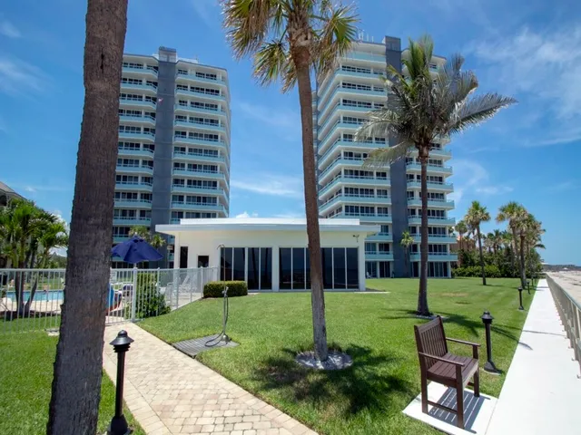 a view of swimming pool with a yard