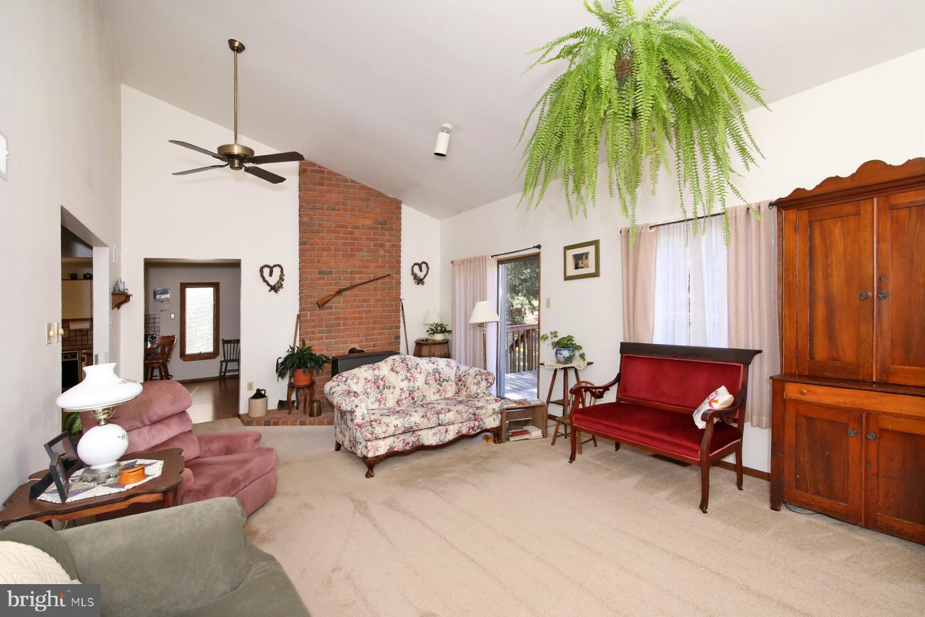 575 Bachmanville Road Hershey, PA 17033 - Photo 15 of 57 a living room with furniture and a potted plant