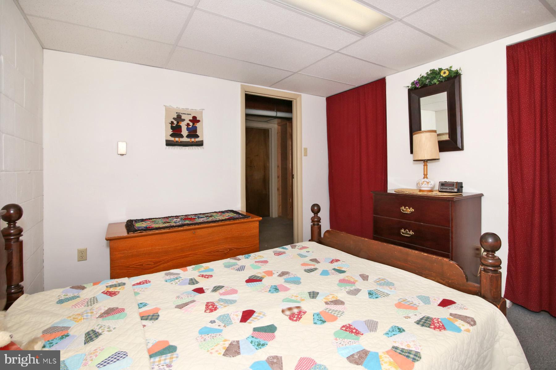 575 Bachmanville Road Hershey, PA 17033 - Photo 40 of 57 a bedroom with a bed and a dresser