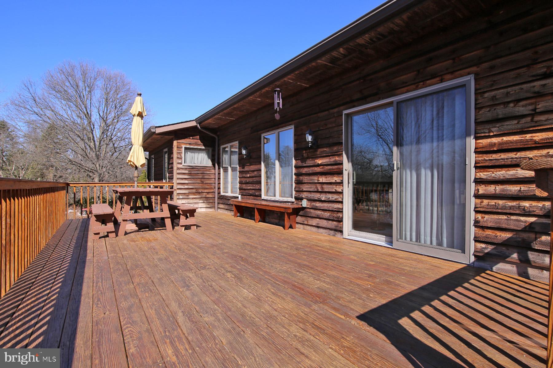 575 Bachmanville Road Hershey, PA 17033 - Photo 7 of 57 a view of a house with wooden floor and roof