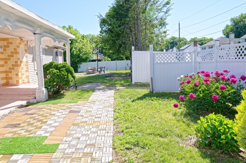 1 Rockland Rd Court Auburn, MA 01501 - Photo 4 of 38 a view of a backyard with garden