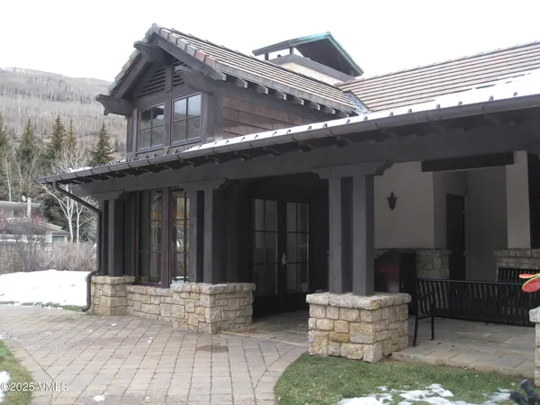 a brick house with a large windows