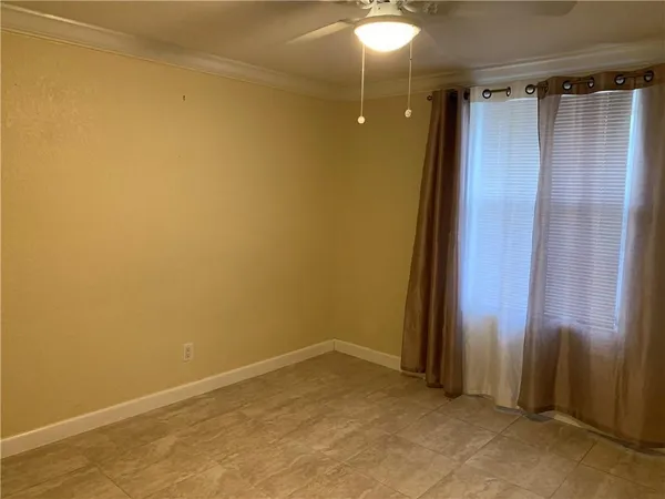 an empty room with a bathroom