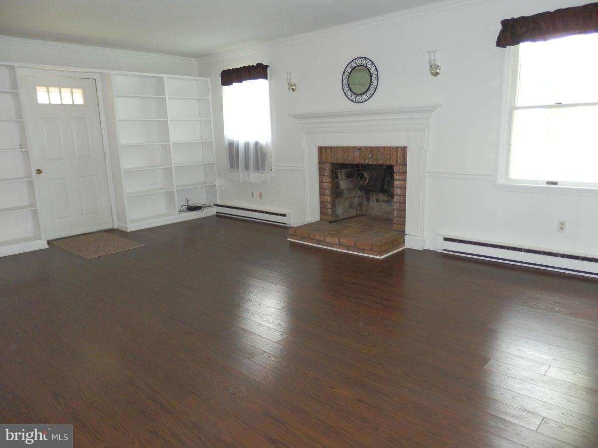 14512 Roddy Road Thurmont, MD 21788 - Photo 6 of 19 Living Room with a wood burning fireplace