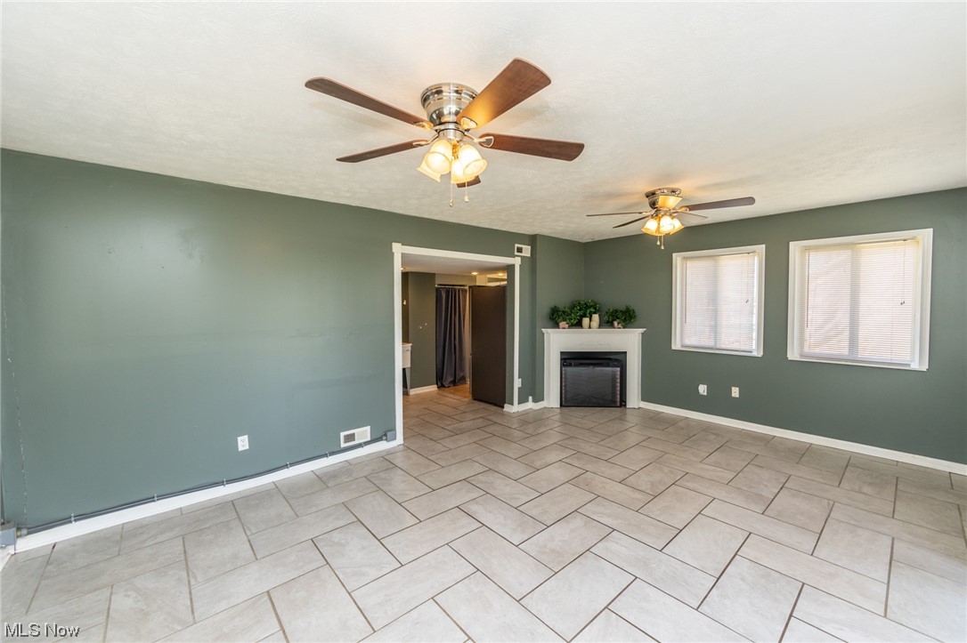 1913 Graham Road Stow, OH 44224 - Photo 14 of 35 Family Rm with Tile Floor and Fireplace