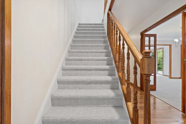 a view of balcony with wooden floor