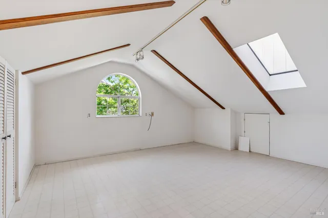 a view of backyard with plants and garden