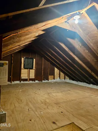 a aerial view of a house with a yard