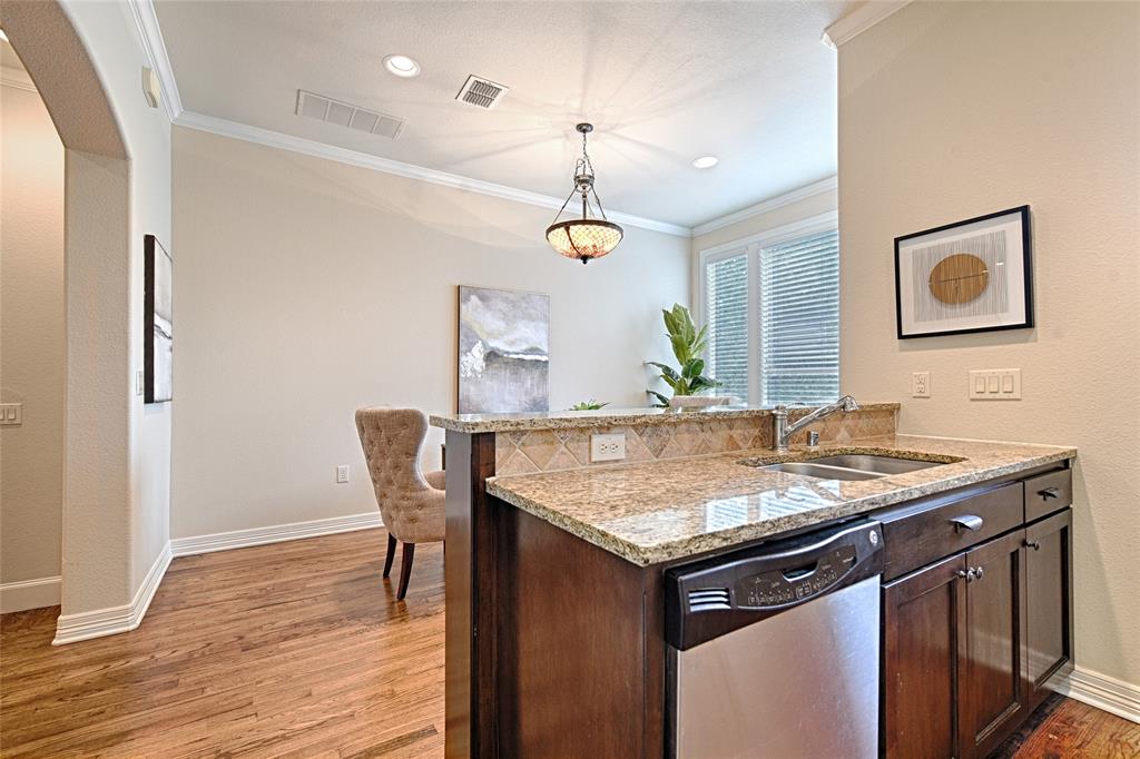6269 Oram Street, Unit 10 Dallas, TX 75214 - Photo 7 of 25 a kitchen with a counter space a sink and appliances