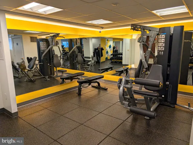 a view of garage with cars