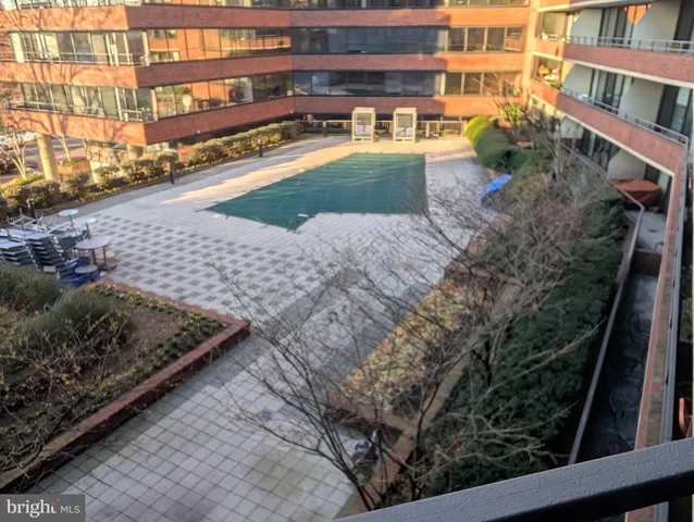 a front view of building with yard