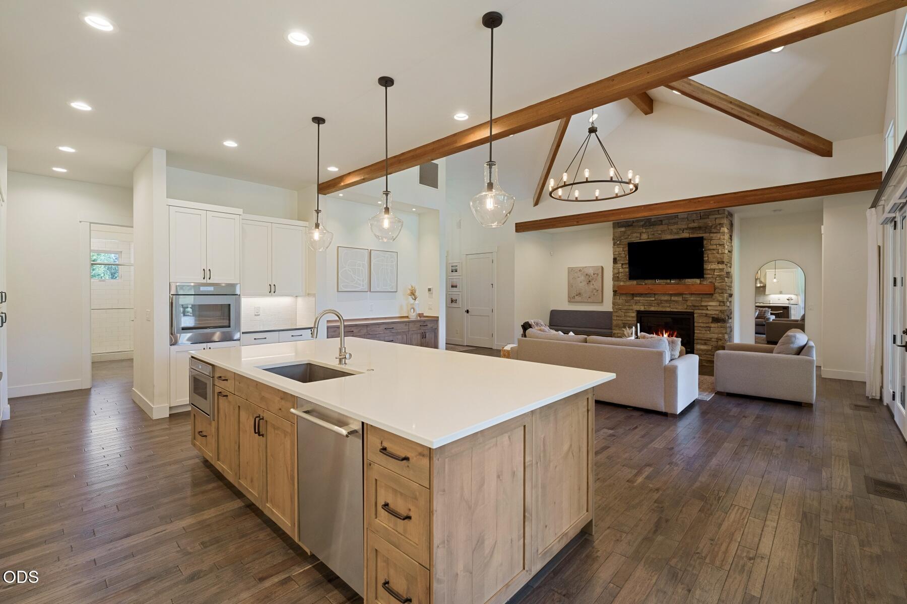 60255 Sunset View Drive Bend, OR 97702 - Photo 16 of 48 a view of kitchen with sink microwave and stove