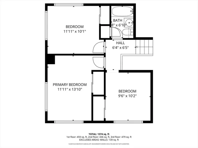 a picture of a bench in front of a gate