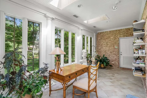 a bedroom with a bed and furniture